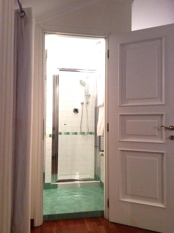 Kúpeľňa v ubytovaní Apartment La Mansarda