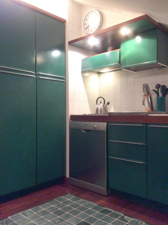 Kuchyňa alebo kuchynka v ubytovaní Apartment La Mansarda