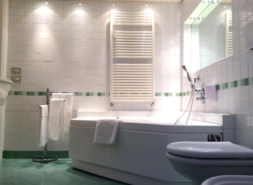 Kúpeľňa v ubytovaní Apartment La Mansarda