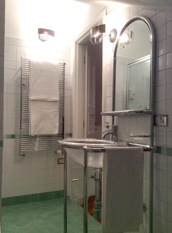 Kúpeľňa v ubytovaní Apartment La Mansarda