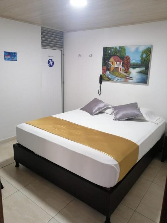 Postel nebo postele na pokoji v ubytování Hotel La Castellana