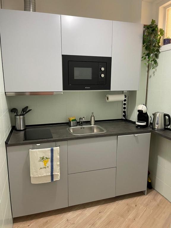A kitchen or kitchenette at Belappart