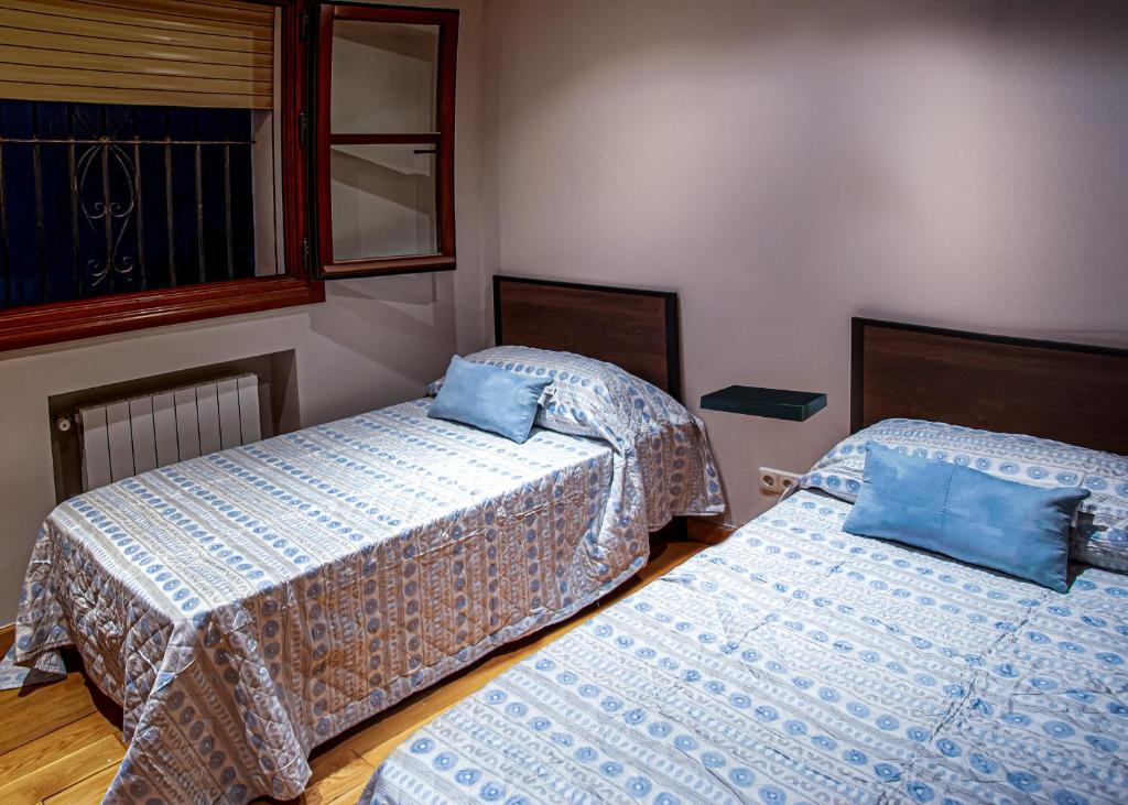 Postel nebo postele na pokoji v ubytování Apartamento Rústico en Ojén