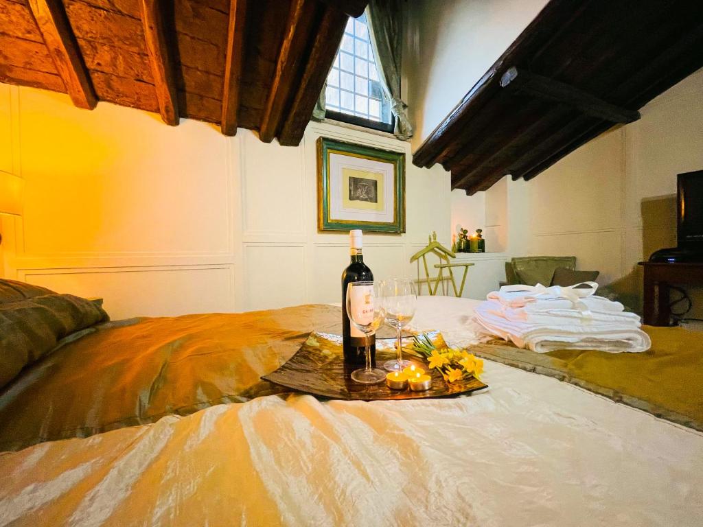 Llit o llits en una habitació de Piazza Venezia Lulus Home