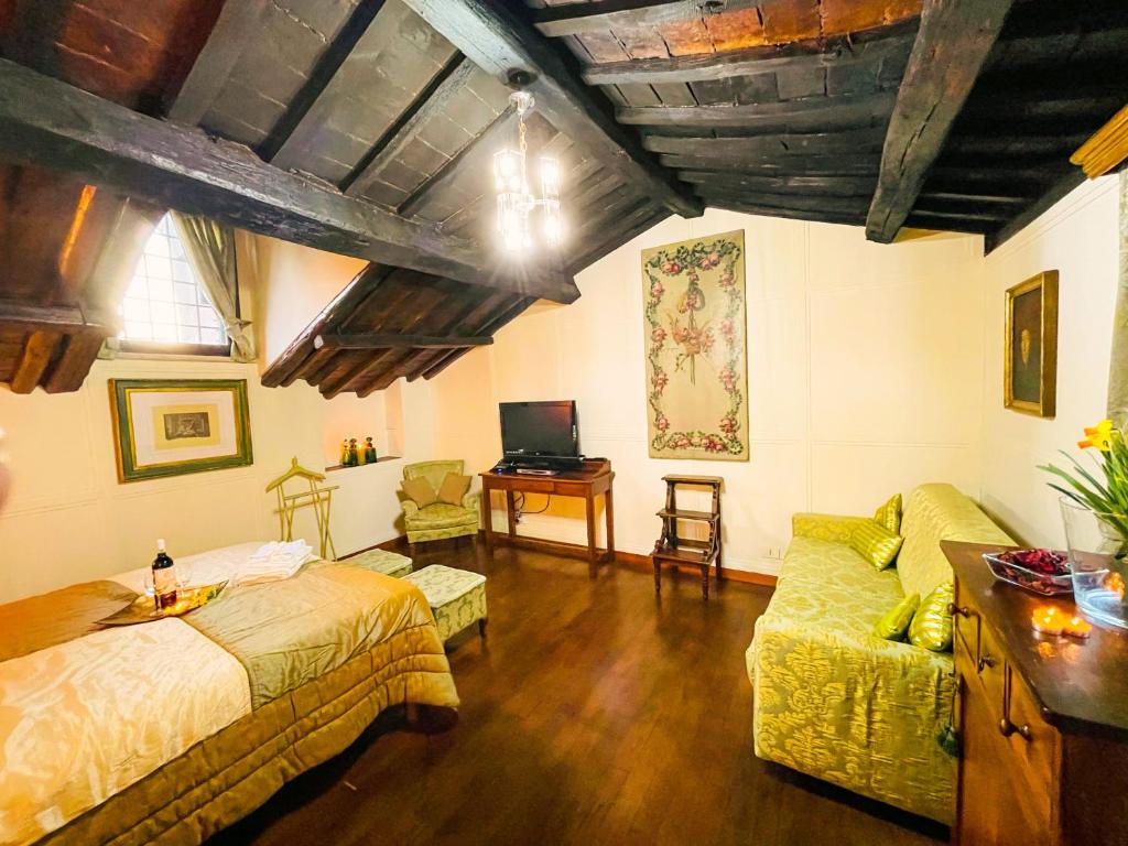 Llit o llits en una habitació de Piazza Venezia Lulus Home