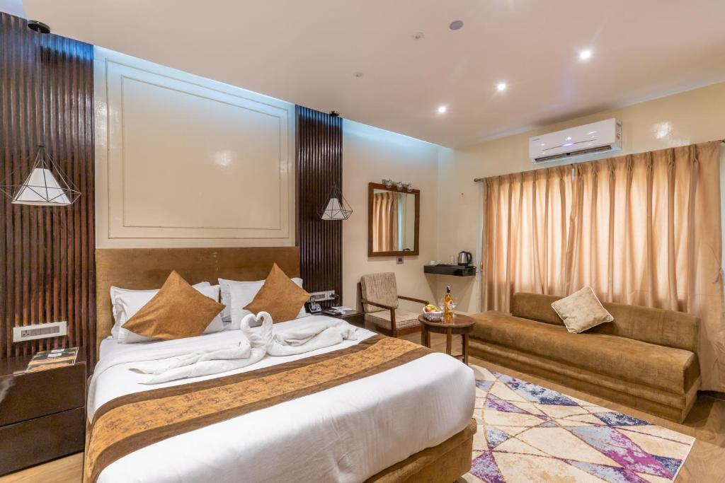 Voodi või voodid majutusasutuse Nansc Hotel toas