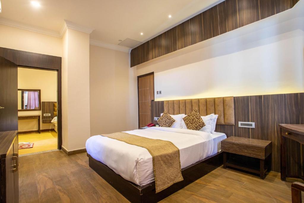 Voodi või voodid majutusasutuse Nansc Hotel toas