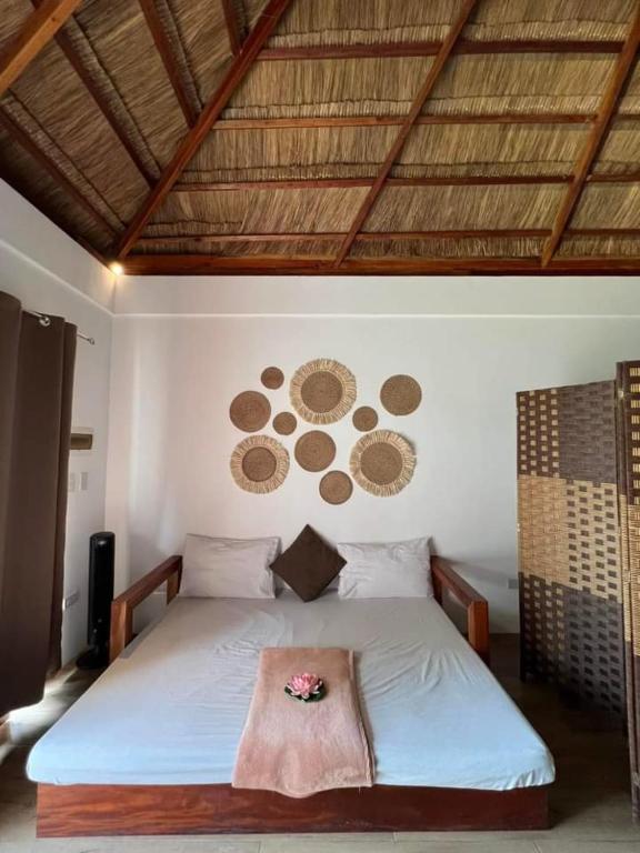 Postel nebo postele na pokoji v ubytování SAMADHI Resort & Hydrospa Panglao