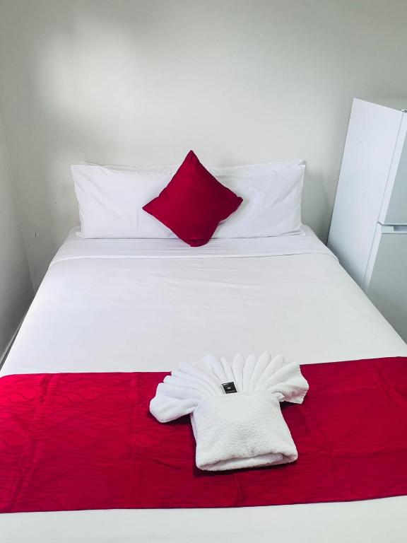 Postel nebo postele na pokoji v ubytování Dash Motel, Papakura