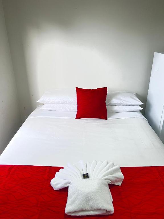 Postel nebo postele na pokoji v ubytování Dash Motel, Papakura