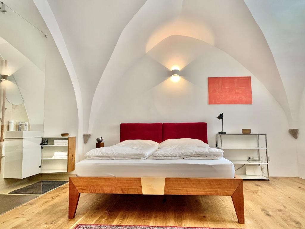 Giường trong phòng chung tại Appartements im Herzen der Passauer Altstadt
