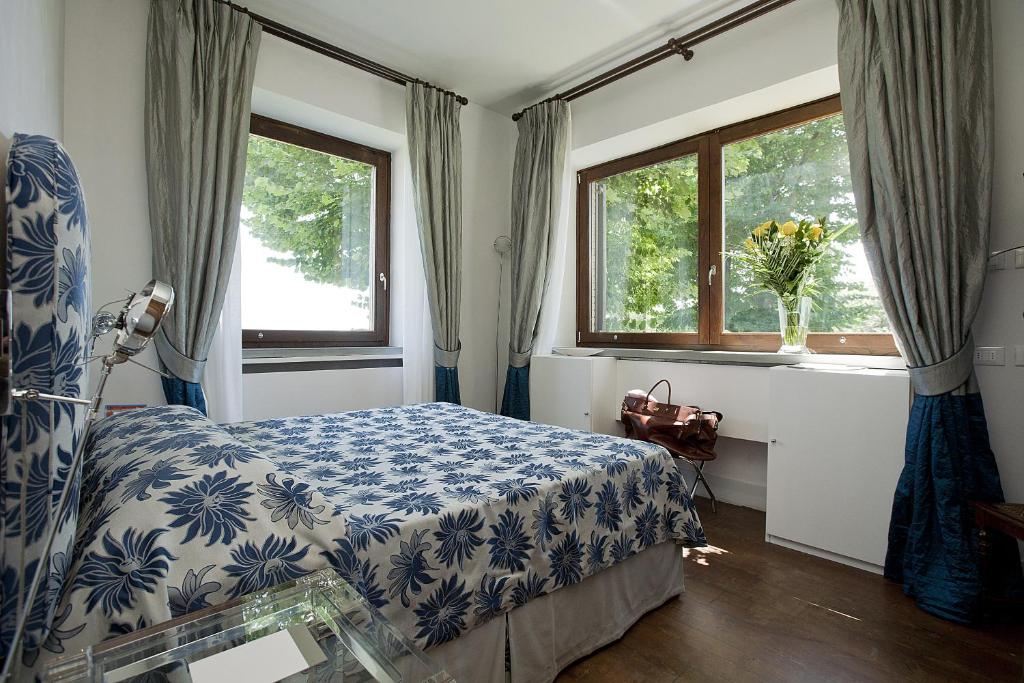 Postel nebo postele na pokoji v ubytování Tenuta Ponziani Wine Resort&Spa