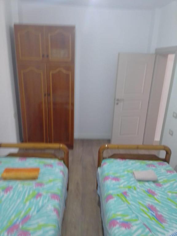 Postel nebo postele na pokoji v ubytování Beta Holidays