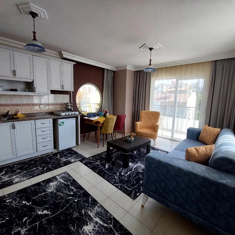 Kuchyň nebo kuchyňský kout v ubytování Summer rose hotel