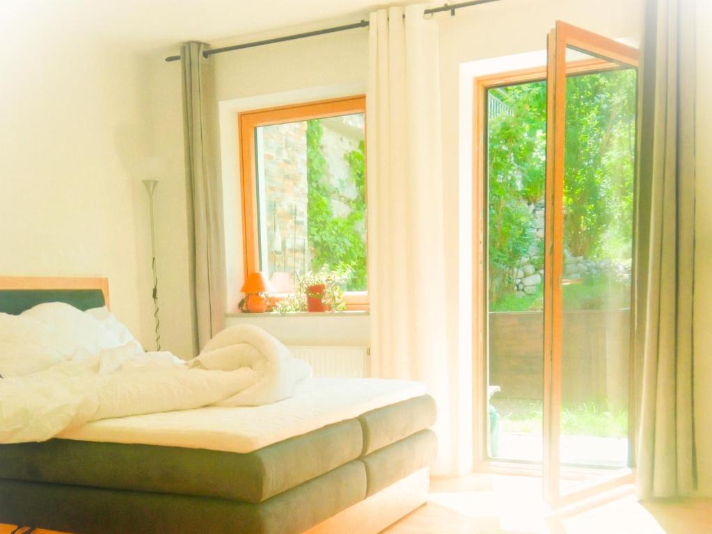 Postel nebo postele na pokoji v ubytování Appartement Birgla