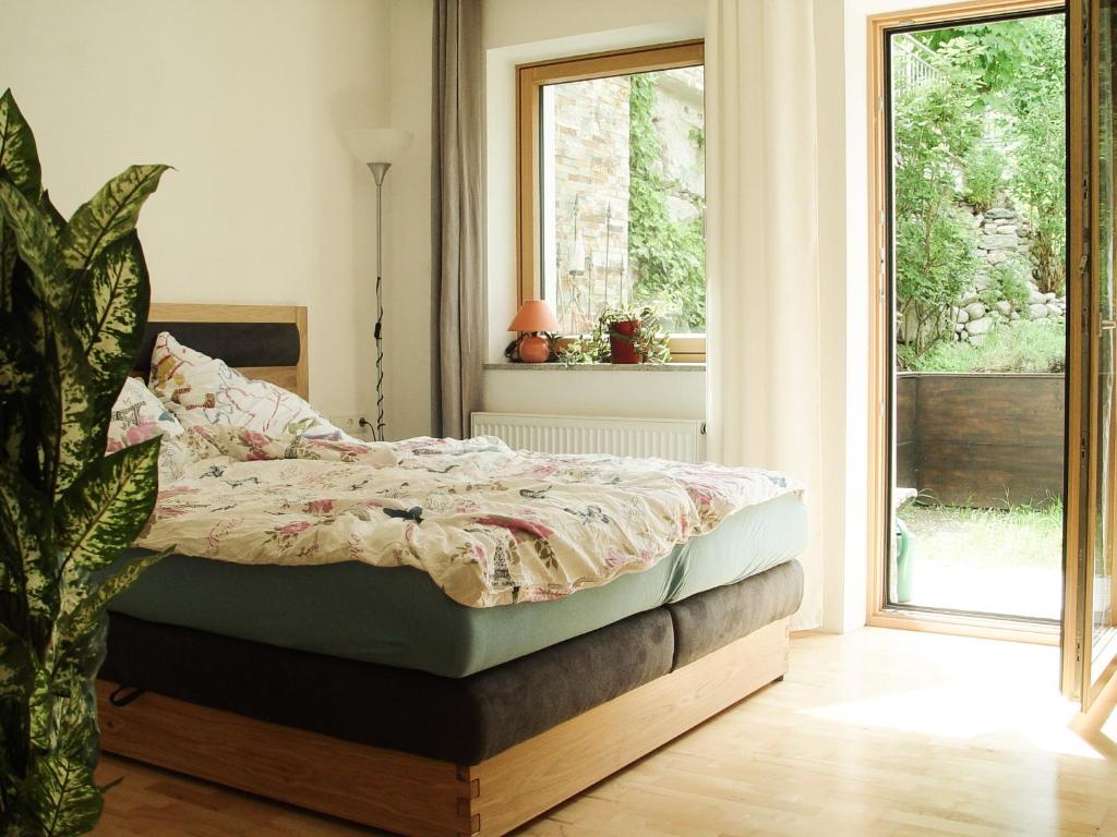 Postel nebo postele na pokoji v ubytování Appartement Birgla