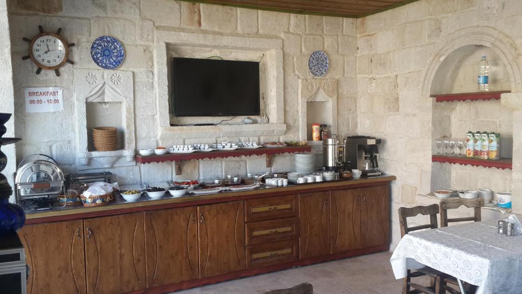 Kuchyň nebo kuchyňský kout v ubytování Arif Cave Hotel
