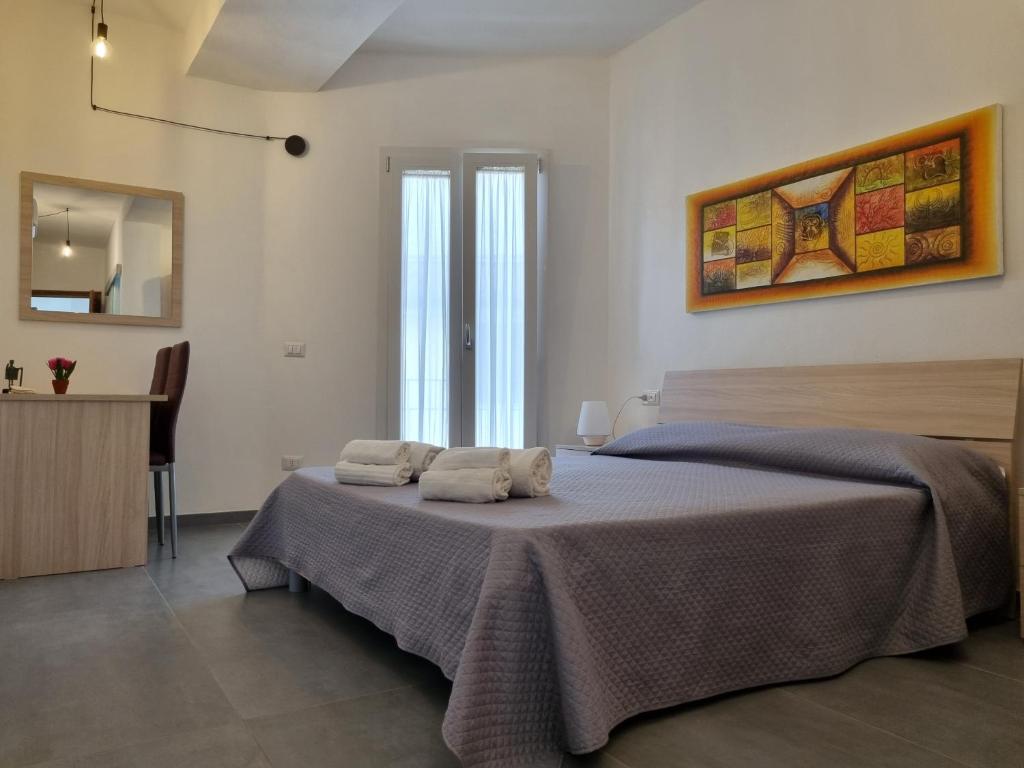 Katil atau katil-katil dalam bilik di Sardiniarooms Tortolì Old Town