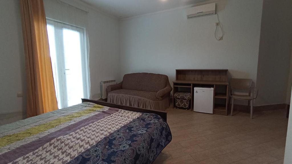 Postel nebo postele na pokoji v ubytování Guest House KARLA