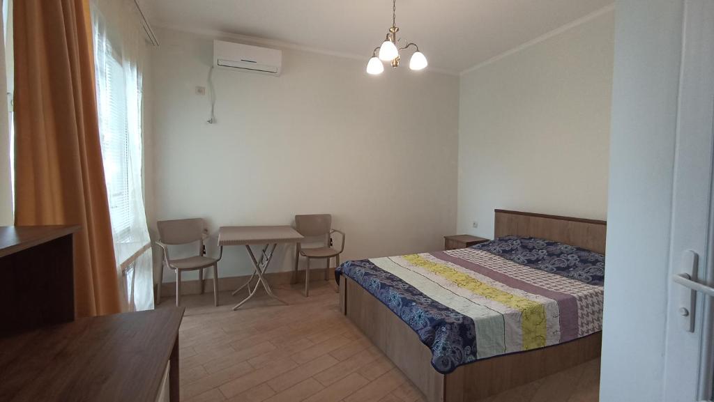 Postel nebo postele na pokoji v ubytování Guest House KARLA
