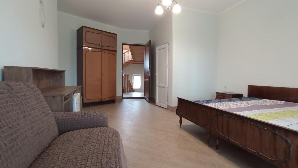Postel nebo postele na pokoji v ubytování Guest House KARLA