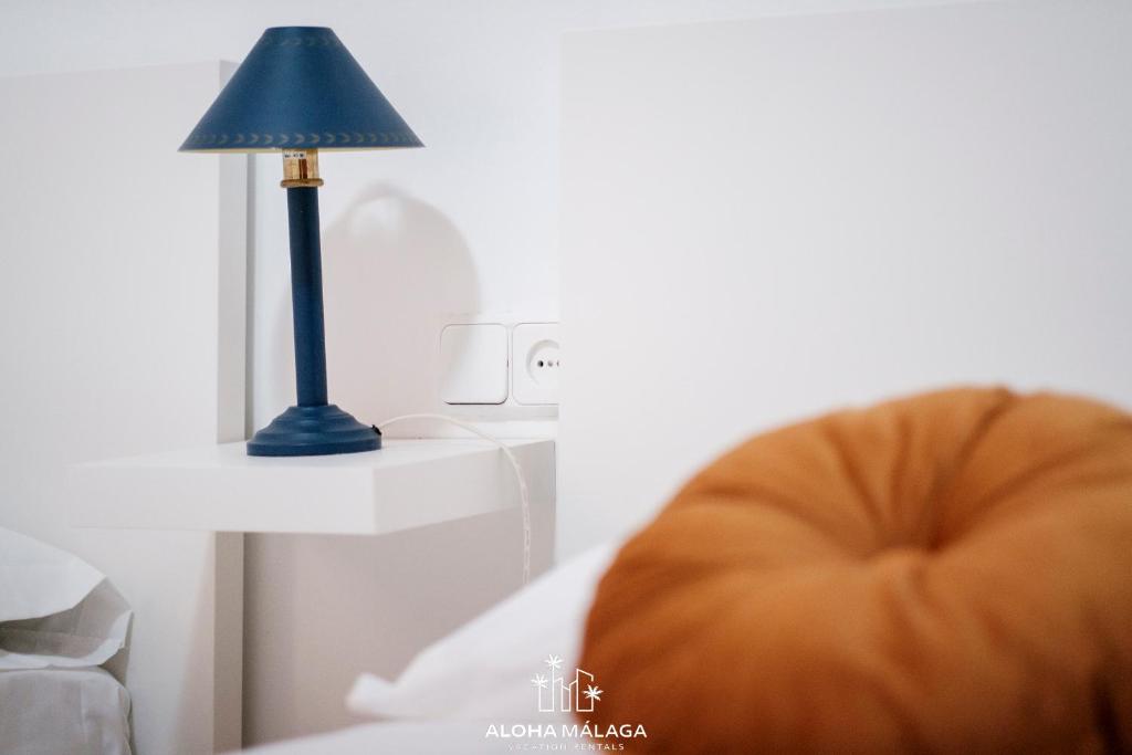 A bed or beds in a room at Wonderful Malaga Centro Apartment