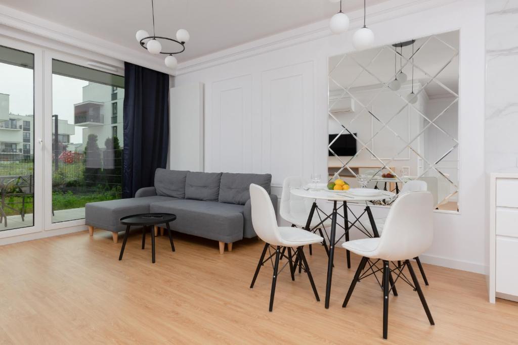 A seating area at Bemowo Coopera Apartment Parking & Taras by Renters Prestige