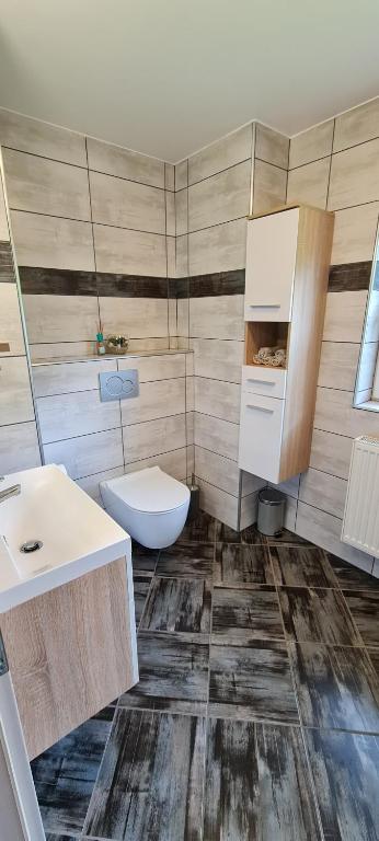 Koupelna v ubytování Apartmaji Gaby