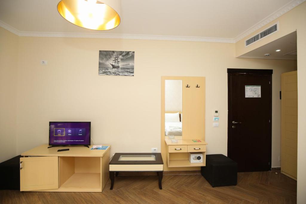 TV a/nebo společenská místnost v ubytování Hotel Summer Stars