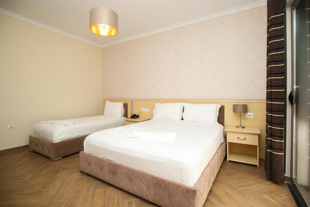 Postel nebo postele na pokoji v ubytování Hotel Summer Stars