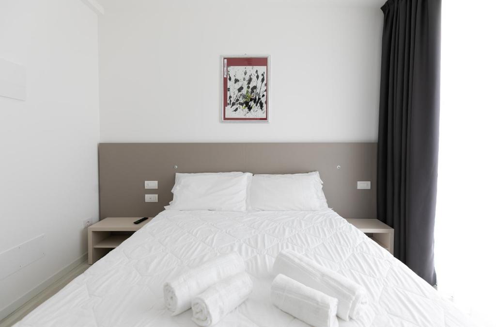 Postel nebo postele na pokoji v ubytování Hotel Boston 3 Stelle Superior Frontemare