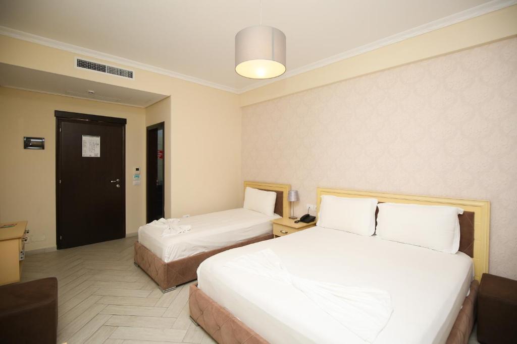 Postel nebo postele na pokoji v ubytování Hotel Summer Stars