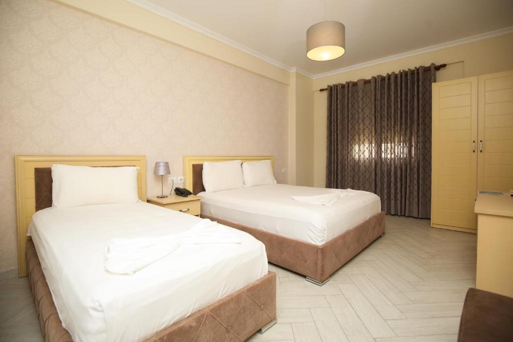 Postel nebo postele na pokoji v ubytování Hotel Summer Stars