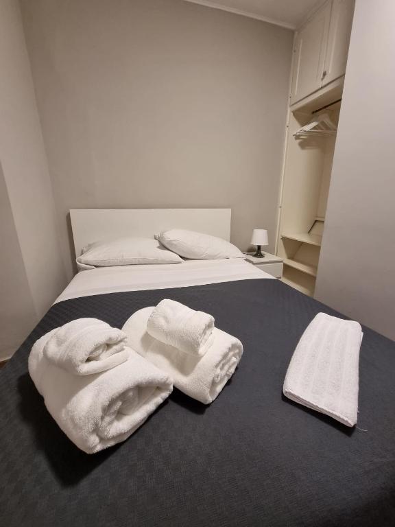 Una cama o camas en una habitación de Osteria Pozzo