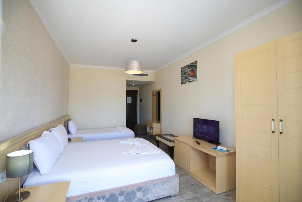 TV a/nebo společenská místnost v ubytování Hotel Summer Stars