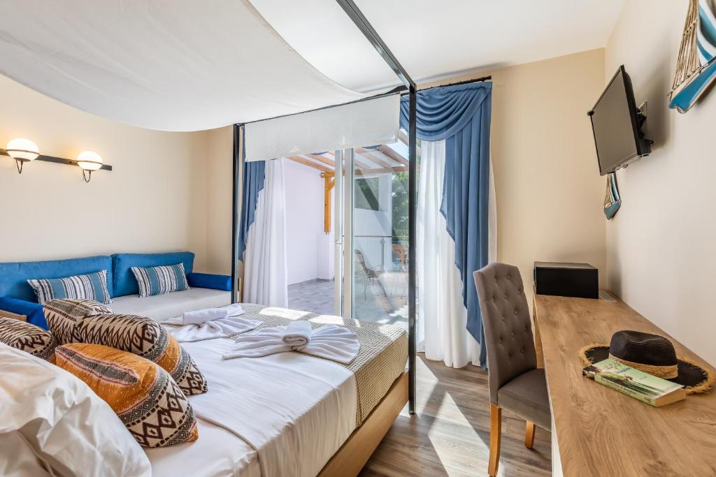 Postel nebo postele na pokoji v ubytování AGNONTAS LUXURY VILLAS