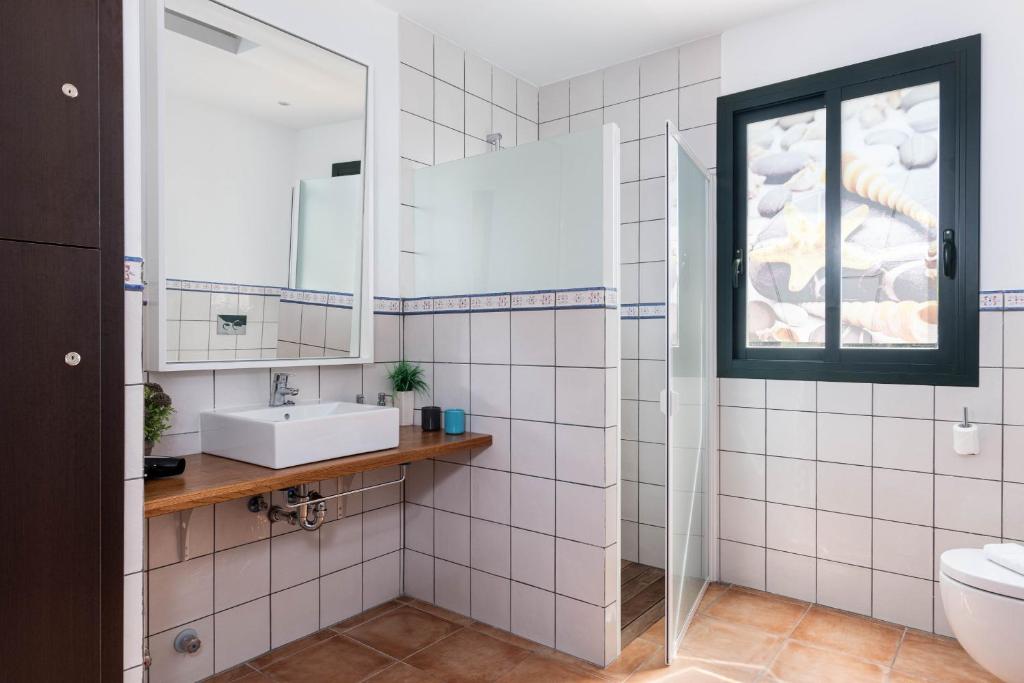 Koupelna v ubytování YourHouse Romani Villa