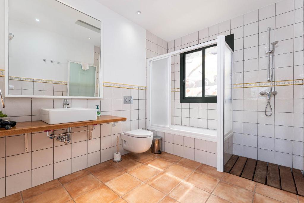 Koupelna v ubytování YourHouse Romani Villa