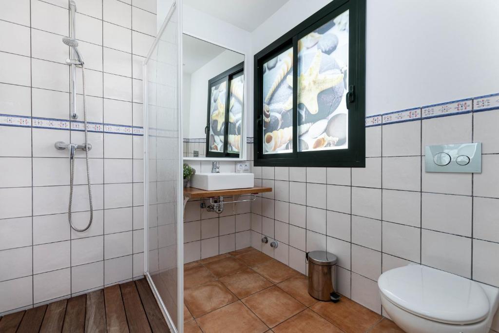 Koupelna v ubytování YourHouse Romani Villa