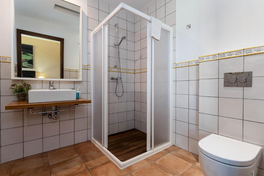 Koupelna v ubytování YourHouse Romani Villa