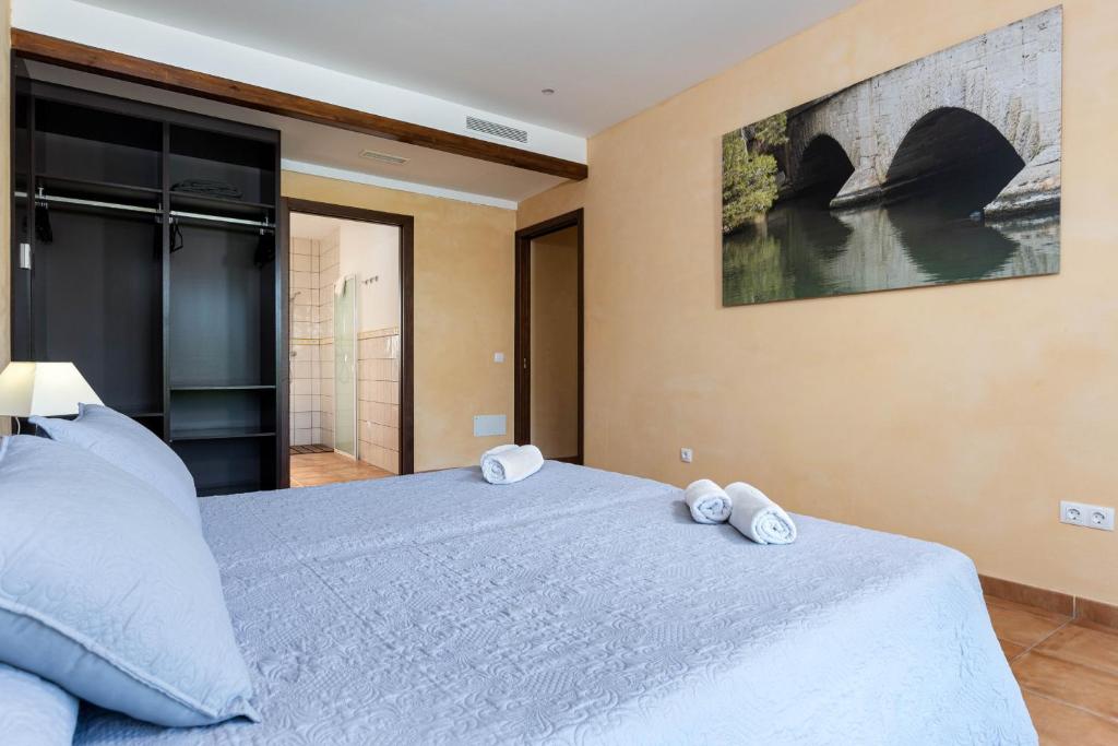 Postel nebo postele na pokoji v ubytování YourHouse Romani Villa
