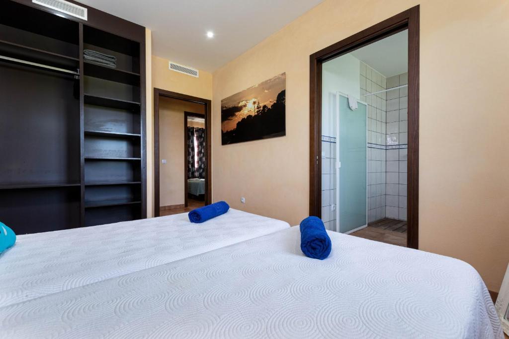 Postel nebo postele na pokoji v ubytování YourHouse Romani Villa