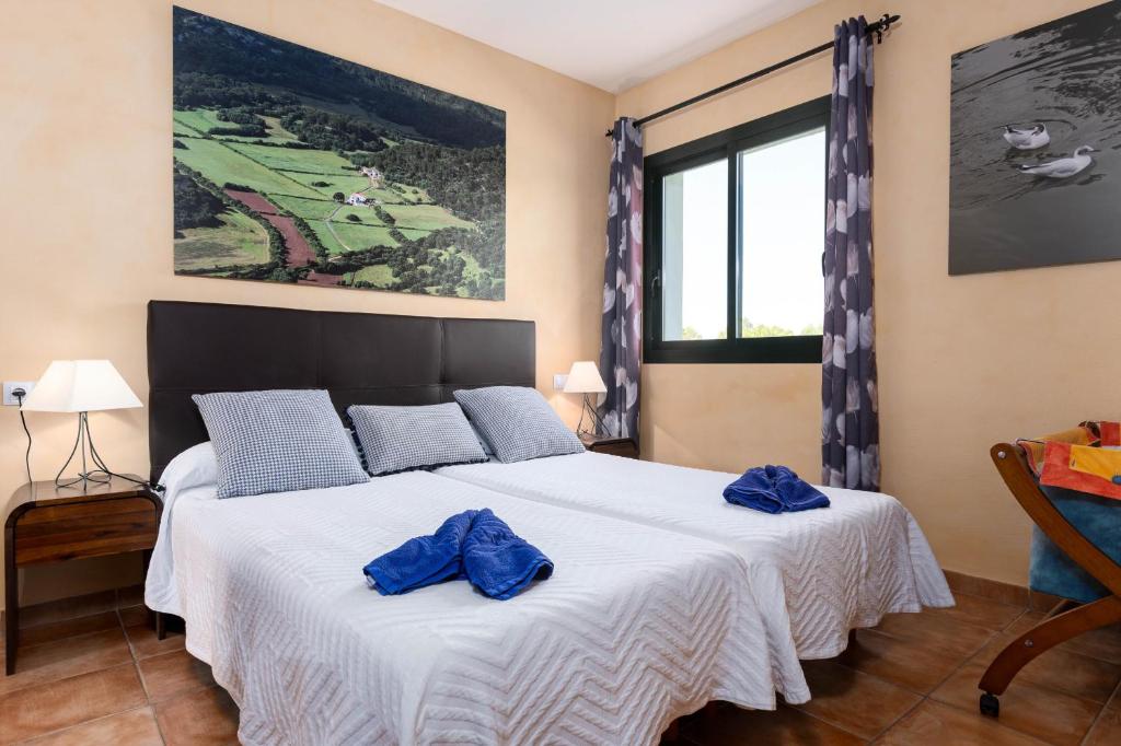 Postel nebo postele na pokoji v ubytování YourHouse Romani Villa