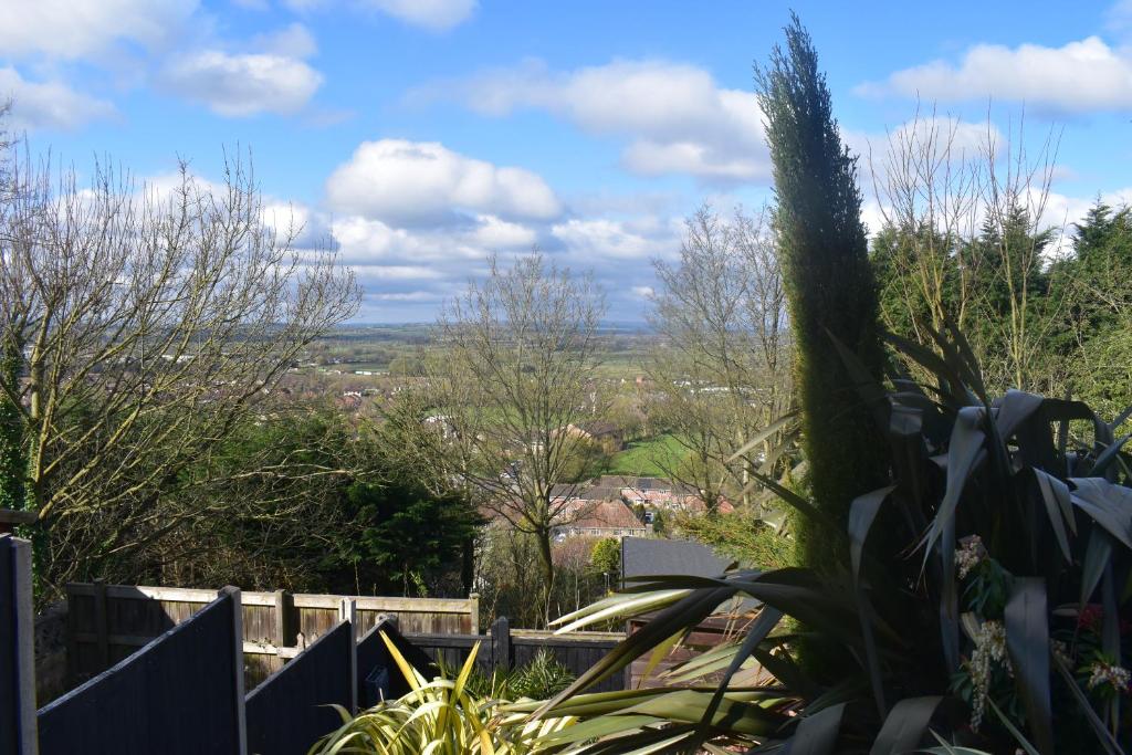 a view of the countryside from the garden at Starlight Cottage Room Only In Glastonbury in Glastonbury