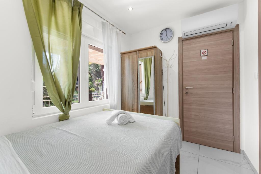 Postel nebo postele na pokoji v ubytování Alice rooms