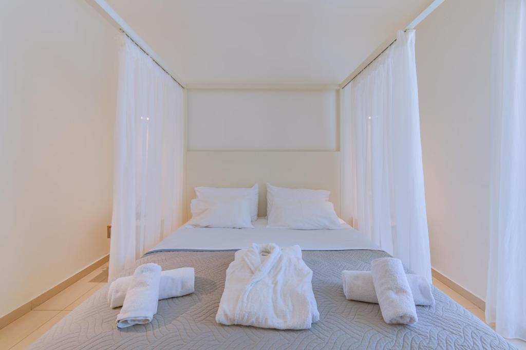 Postel nebo postele na pokoji v ubytování Inspira Boutique Hotel Thassos - Adults Only