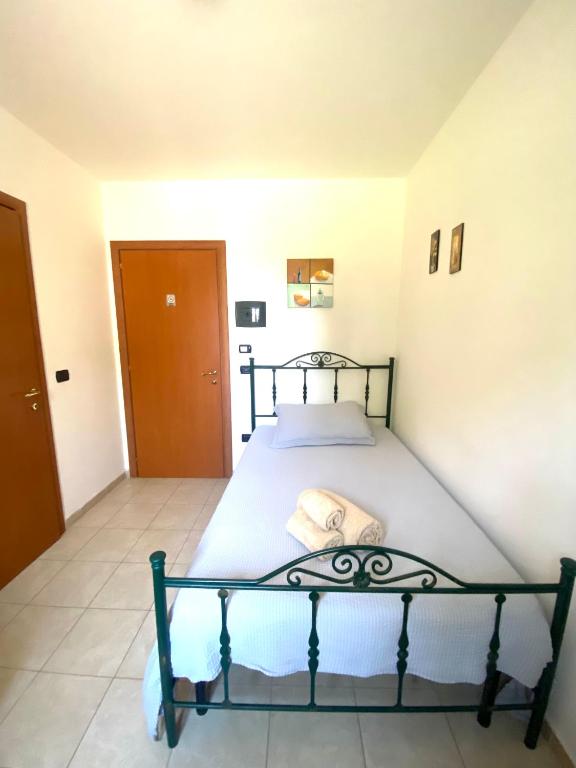 Postel nebo postele na pokoji v ubytování Villa Pedrosu