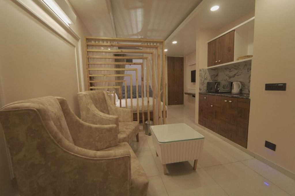Posezení v ubytování Myst Luxury stays