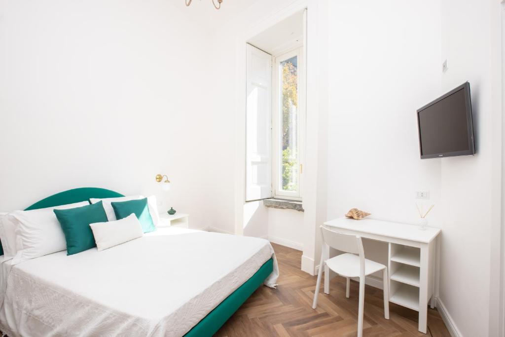 Postel nebo postele na pokoji v ubytování Lux Aurea