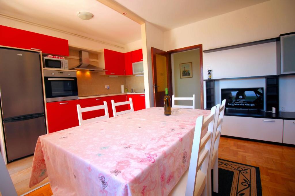 Kuchyň nebo kuchyňský kout v ubytování Apartmens Adriana